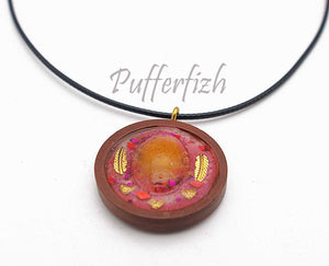Resin pendent with gold leaf and matching cord