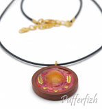 Resin pendent with gold leaf and matching cord