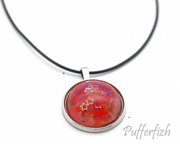 Red resin pendent with matching cord